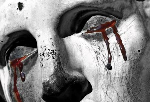 Oedipus stabs out his eyes